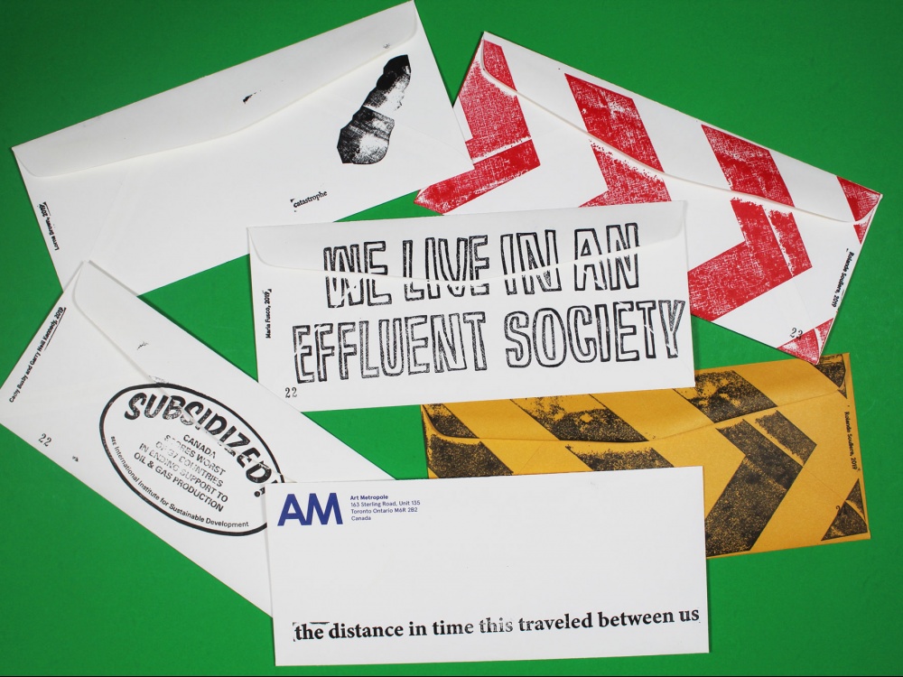 Collection of envelopes featuring works by artists Lorna Brown, Cathy Busby & Garry Neill Kennedy, Maria Fusco, David Horvitz, and Rolande Souliere